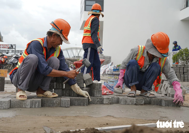 Dự án ngăn triều 10.000 tỉ ở TP.HCM tất bật thi công, nỗ lực về đích cuối năm 2026 - Ảnh 6.