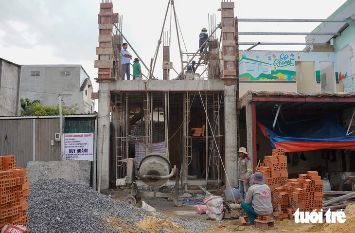 Người dân tất bật dọn nhà, nhường mặt bằng mở rộng Quốc lộ 13 trước ngày khởi công - Ảnh 7.