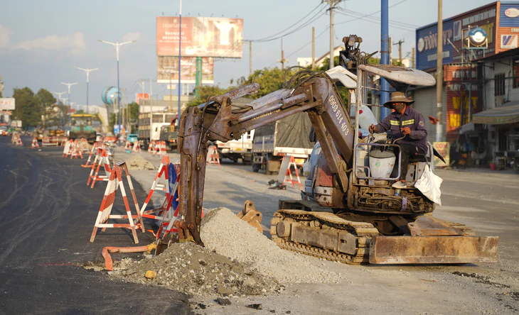 Người dân tất bật dọn nhà, nhường mặt bằng mở rộng Quốc lộ 13 trước ngày khởi công - Ảnh 21.