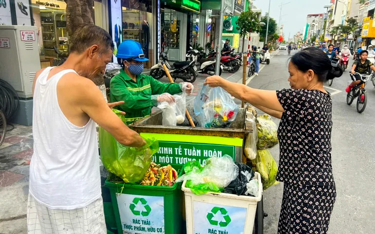 TP.HCM đang làm gì để hóa giải bài toán 14.000 tấn rác/ngày? - Ảnh 3.