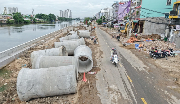 Di dời nhà trên kênh rạch, chính quyền phường gần dân để có chính sách đồng thuận cao - Ảnh 3.