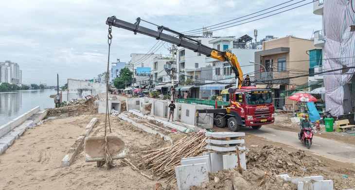 Di dời nhà trên kênh rạch, chính quyền phường gần dân để có chính sách đồng thuận cao - Ảnh 4.