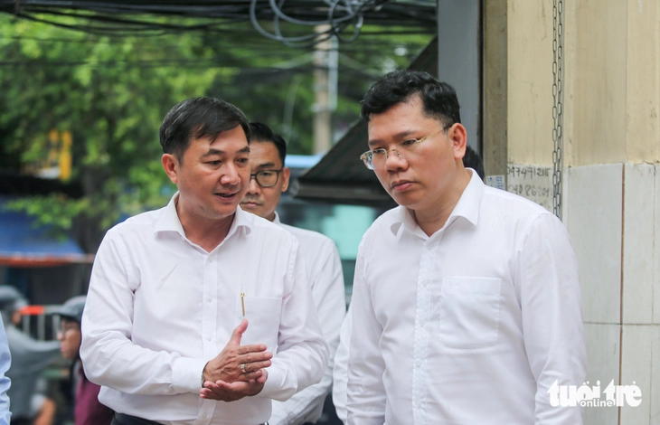 Khai thông mặt bằng trên quốc lộ 13 - Ảnh 4.