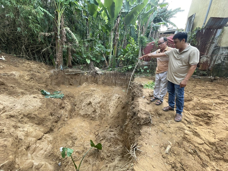Dân báo có 3 mộ liệt sĩ bên chân cầu Câu Lâu, bộ đội đào xuống và tìm thấy cả ống thở cao su của đặc công - Ảnh 1.