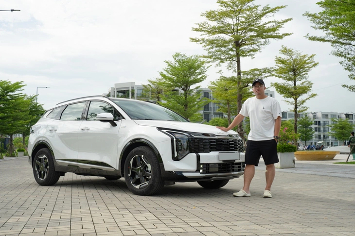 Bán xe sang mua Kia Sportage HEV, chủ xe thấy 'đi phố như xe điện' - Ảnh 1.