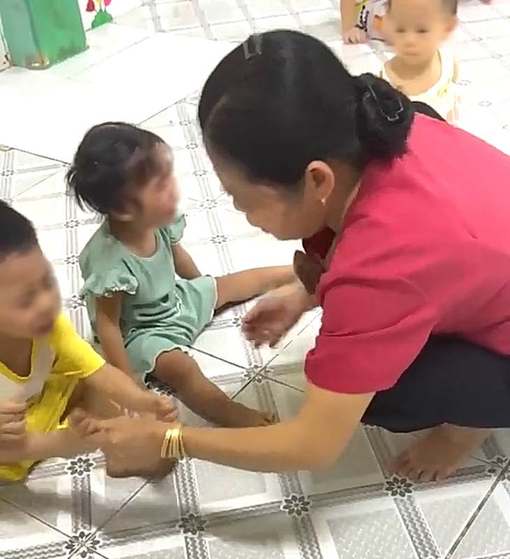 Phường Thuận Giao, TP.HCM làm rõ vụ giáo viên bắn dây thun vào bàn chân trẻ - Ảnh 1.