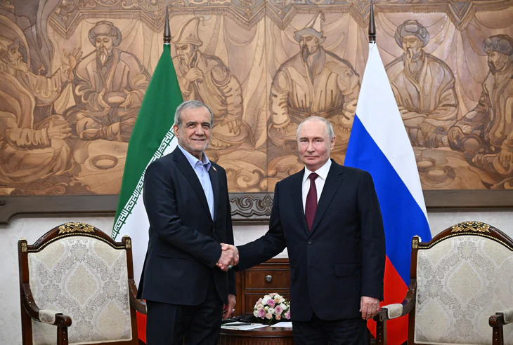 Ông Putin cam kết Nga tiếp tục sát cánh với Iran giữa sức ép từ Mỹ - Ảnh 1.