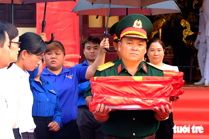 Tây Ninh tổ chức đưa 5.287 mẫu hài cốt liệt sĩ đến sân bay Tân Sơn Nhất chờ đi giám định ADN - Ảnh 5.