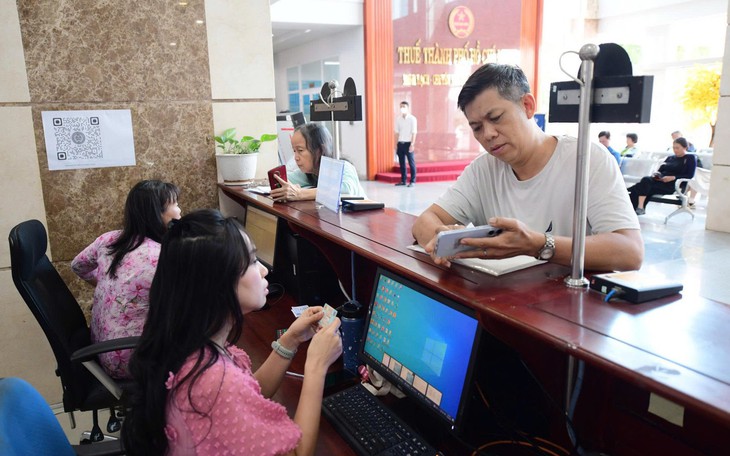 Muốn đóng cửa, doanh nghiệp phải trả hết mọi khoản nợ - Ảnh 2.