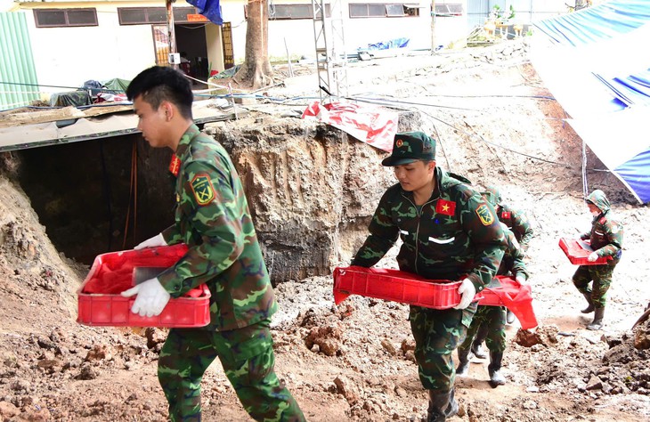 Ngày 17-9: chuyển 500 khối đất, tìm thấy thêm 17 bộ hài cốt liệt sĩ ở công viên Lê Thị Riêng - Ảnh 2.