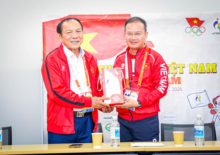 Chủ tịch Ủy ban Olympic Việt Nam 'tiếp lửa' cho đoàn thể thao Việt Nam trước giờ khai mạc Asiad 20 - Ảnh 2.