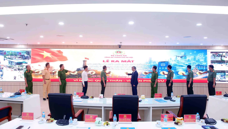 Công an Hà Nội ra mắt 3 sản phẩm chuyển đổi số bảo đảm an ninh, trật tự - Ảnh 1.