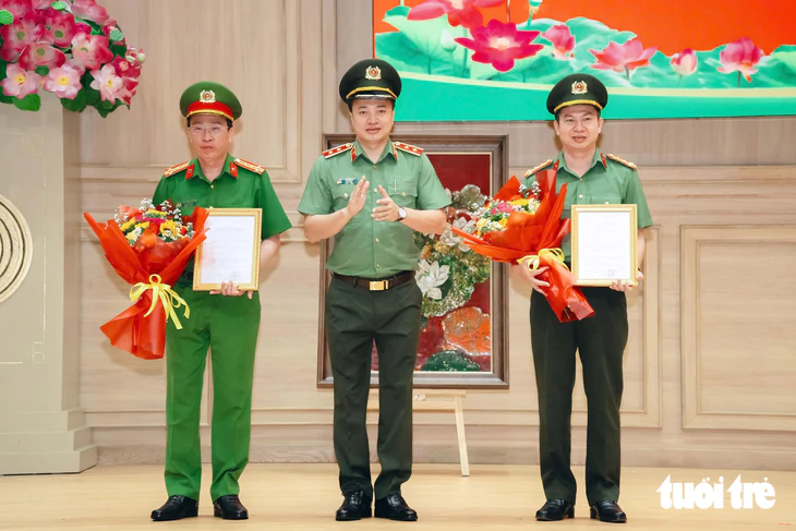 Bộ Công an bổ nhiệm chức danh tư pháp cho hai Phó Giám đốc Công an TP.HCM - Ảnh 1.