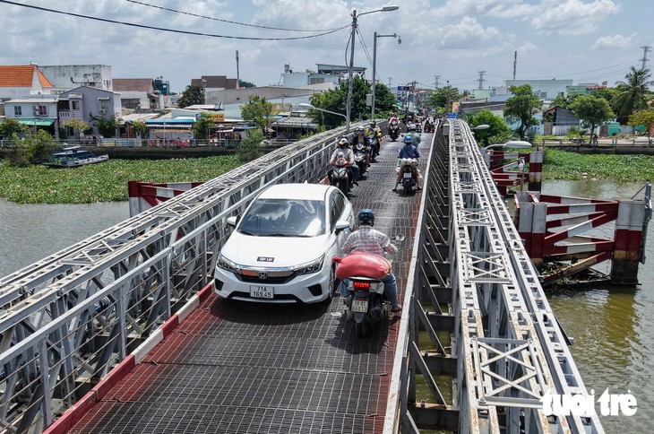 Chốt lộ trình xây cầu Rạch Dơi nối TP.HCM - Tây Ninh, đường về ngoại ô sắp bớt kẹt - Ảnh 1.
