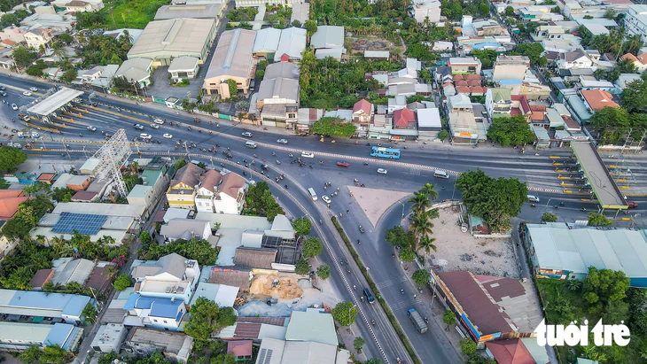 Mở lại giao lộ dẫn vào cầu Phú Long - quốc lộ 13, đổi cách thu phí trạm Lái Thiêu - Ảnh 1.