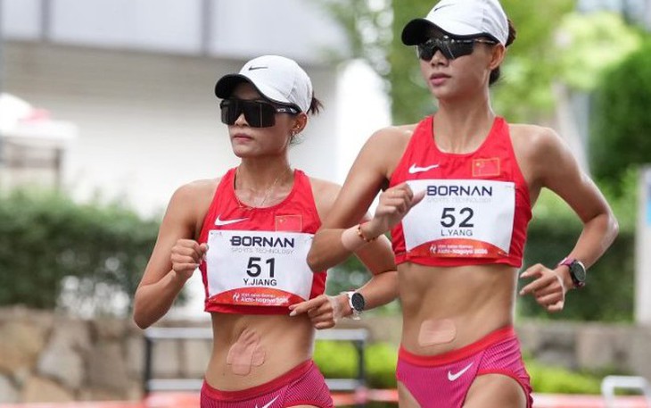 Giành HCĐ Asiad, mẹ vẫn tưởng con đang đi làm - Ảnh 2.
