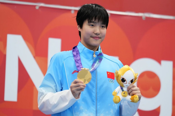 3 HCV Asiad, nữ kình ngư Yu Zidi vẫn là… con nít - Ảnh 1.