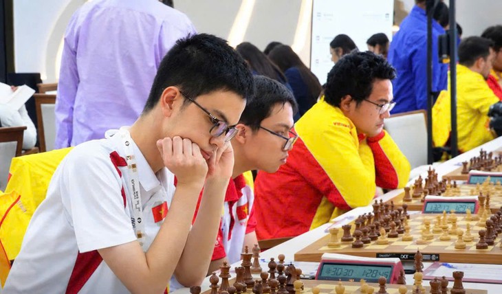 2 kỳ thủ trẻ Việt Nam giành chuẩn Đại kiện tướng tại Olympiad cờ vua - Ảnh 1.