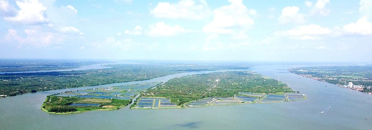 Theo dòng Mekong, 'lời nguyền con rồng' và câu chuyện phát triển - Bài 1: Nơi dòng sông gặp biển - Ảnh 1.
