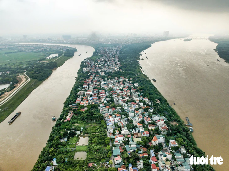 Cụm làng nào ven sông Hồng phải di dời và được giữ lại để làm dự án Trục đại lộ cảnh quan? - Ảnh 1.