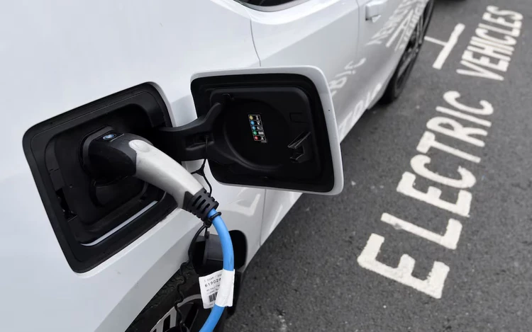 Global EV sales hit record 2.1 million in September, research firm says