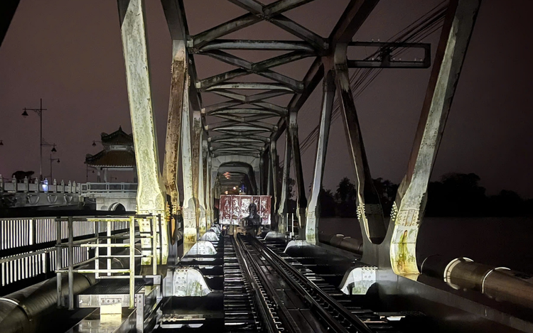 660-tonne rock train used to reinforce railway bridge in flood-hit central Vietnam