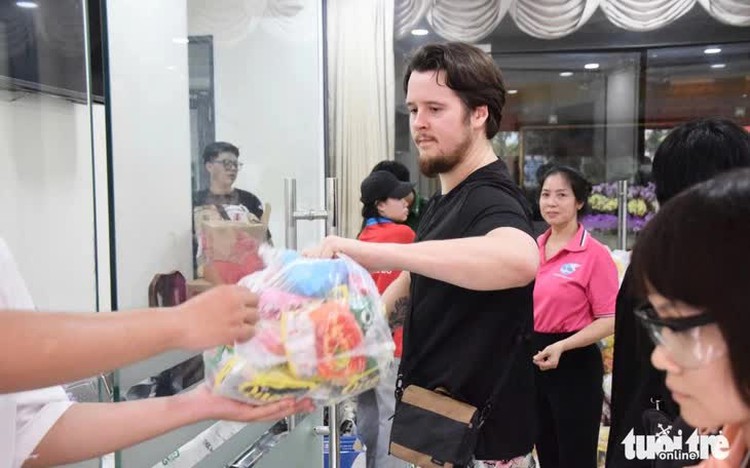 Expats join Ho Chi Minh City locals in flood relief efforts for central Vietnam