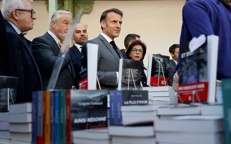 Macron invites international scientists to come work in France