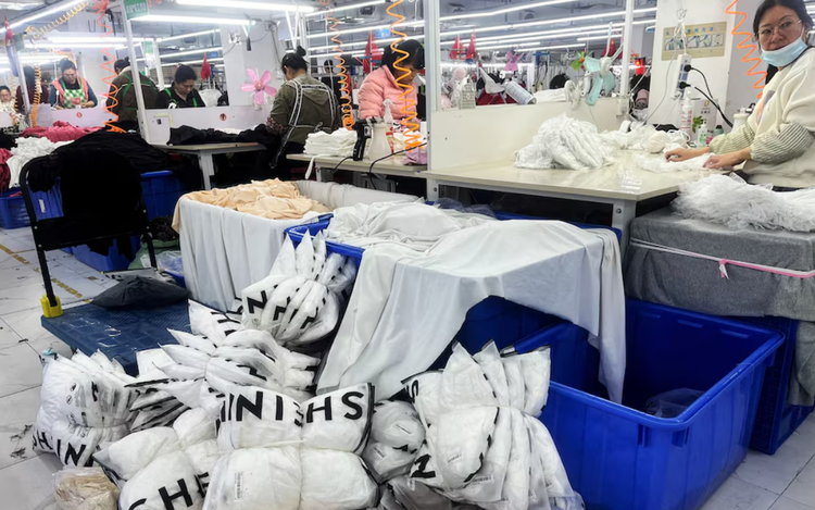 US slashes 'de minimis' tariff on small China parcels to as low as 30%