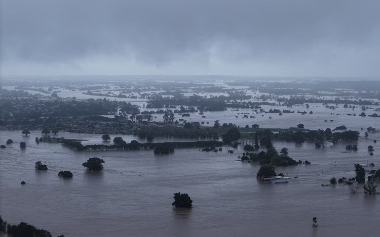 Death toll in Australia floods rises to four, tens of thousands stranded