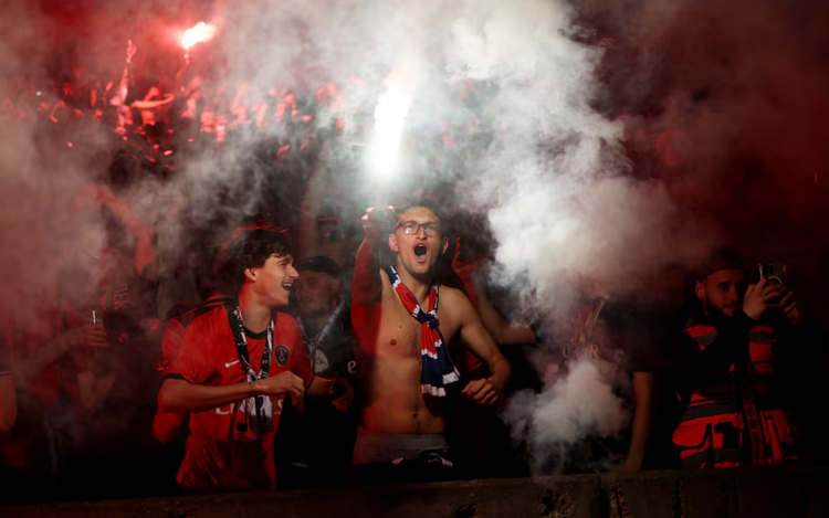 Paris erupts in euphoria before skirmishes as PSG win Champions League