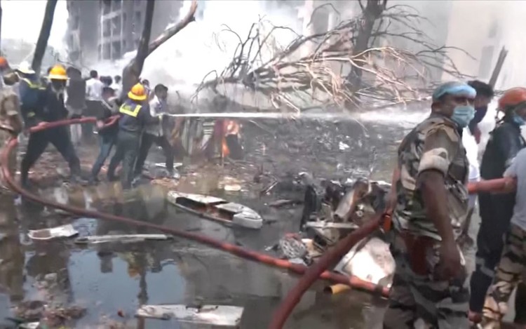 'Many killed' as Air India plane with 242 on board crashes near India's Ahmedabad airport