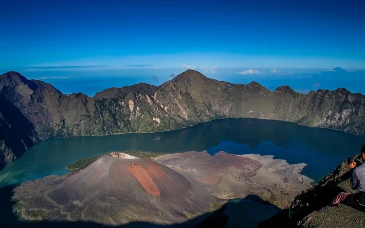 Indonesia races to rescue Brazilian hiker stranded on volcano cliff for four days