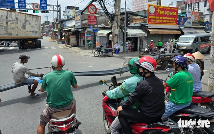 Improvised three-wheeled vehicles still common on Ho Chi Minh City streets
