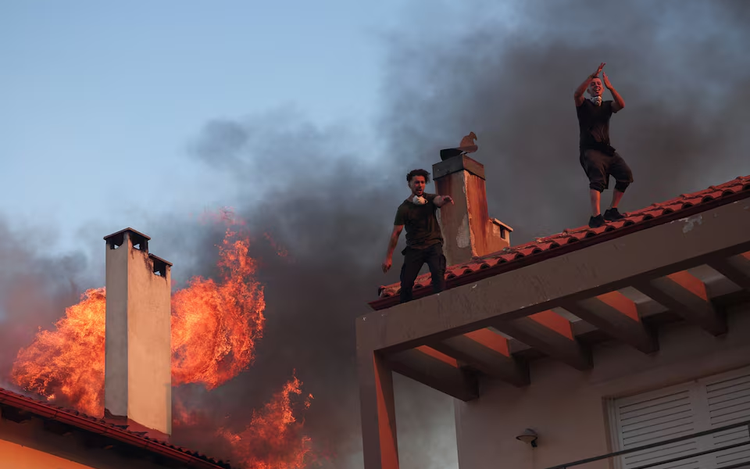 Greece battles wildfires across country, evacuates villages