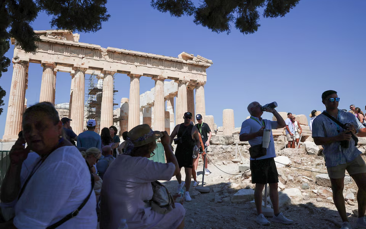 Greece shuts Acropolis for part of day as heat soars, bans outdoor work
