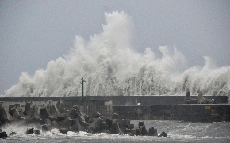 Tropical storm Podul disrupts travel and schools in southern China