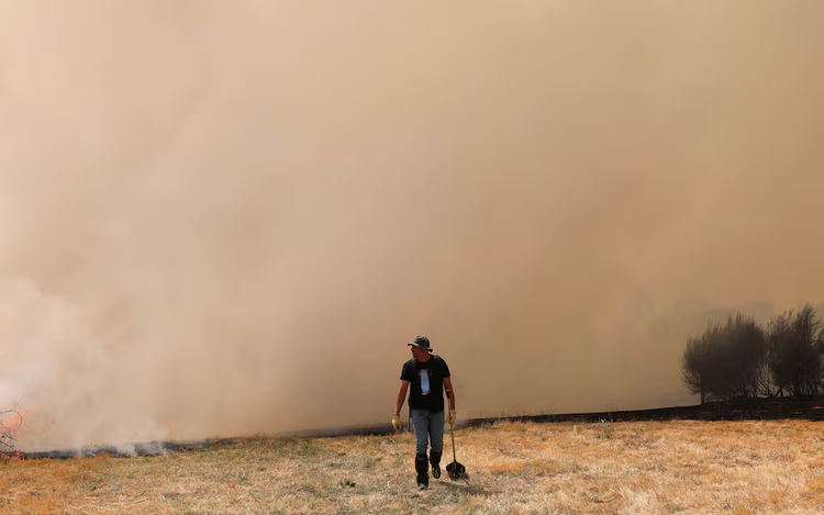 Spain battles 14 major fires with more expected
