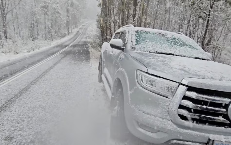 Australian towns blanketed with rare snow in wild weather