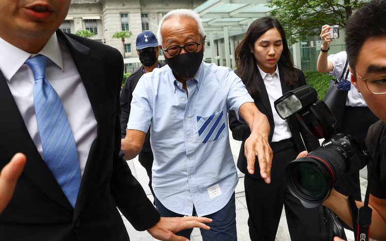 Singapore property tycoon linked to jailed minister pleads guilty
