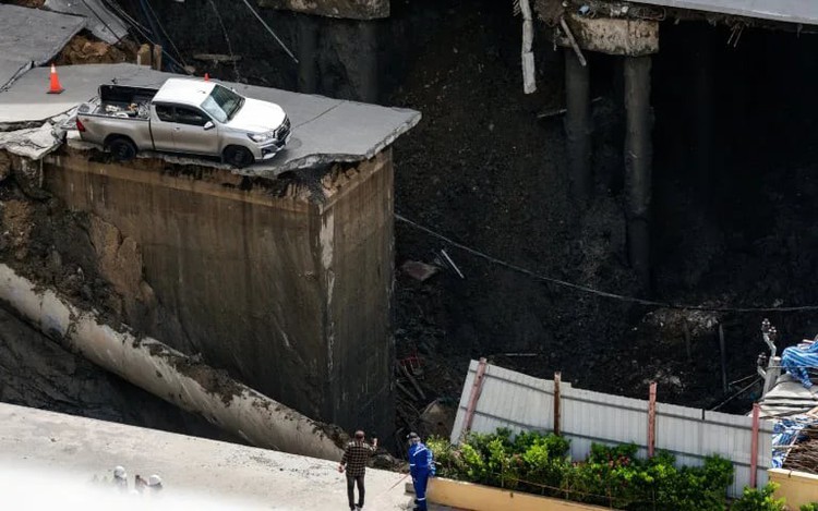 Massive sinkhole in Bangkok street forces evacuations