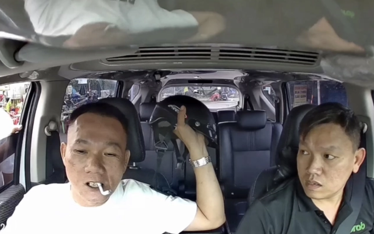 In Vietnam, passenger vandalizes car as Grab driver asks him not to smoke