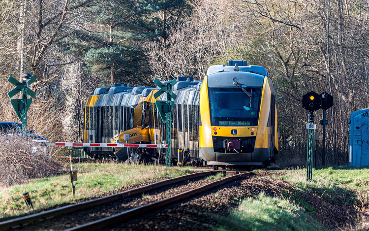 Two trains collide in Denmark, injuring 17 people, emergency service says