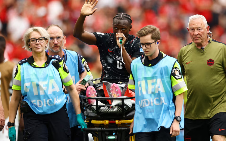 Kone's broken leg casts shadow over Canada's historic World Cup win