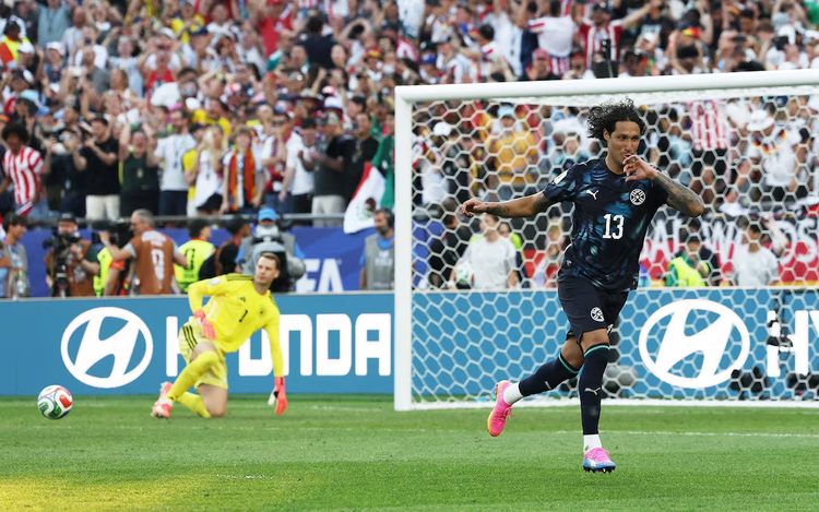 Paraguay stun Germany on penalties to reach World Cup last 16