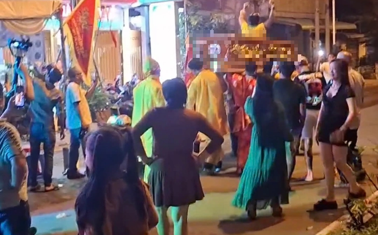 Several people arrested in Vietnam over coffin parade stunt with living person inside