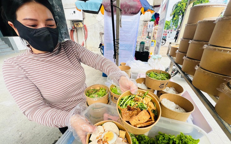 Bowl of soy sauce noodles priced at less than $1 wins over Ho Chi Minh City's breakfast crowd