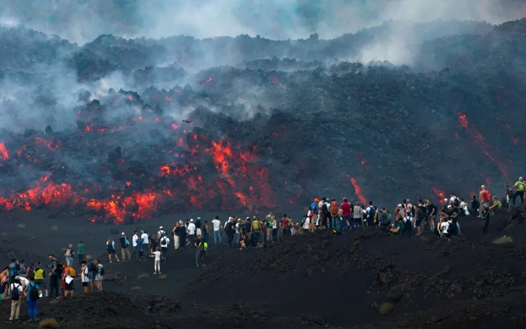Tourists rush to Mount Etna as Italian volcano erupts