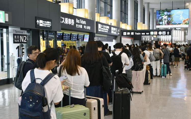 Japan's record rains strand thousands at Narita airport; kill eight