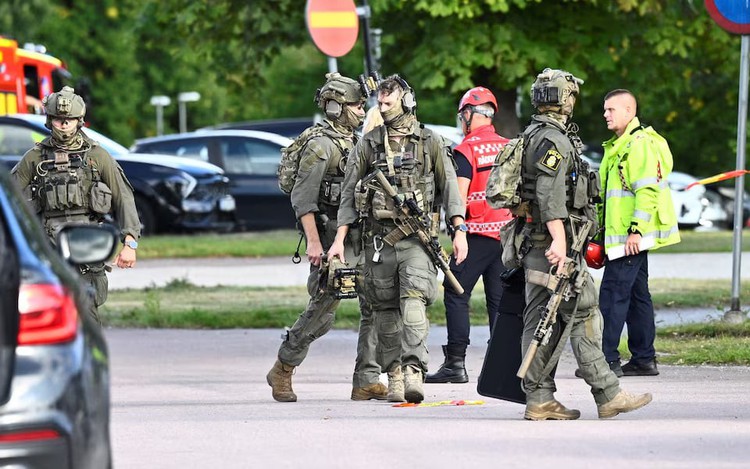 One killed, three injured when man attacks Swedish school with sword